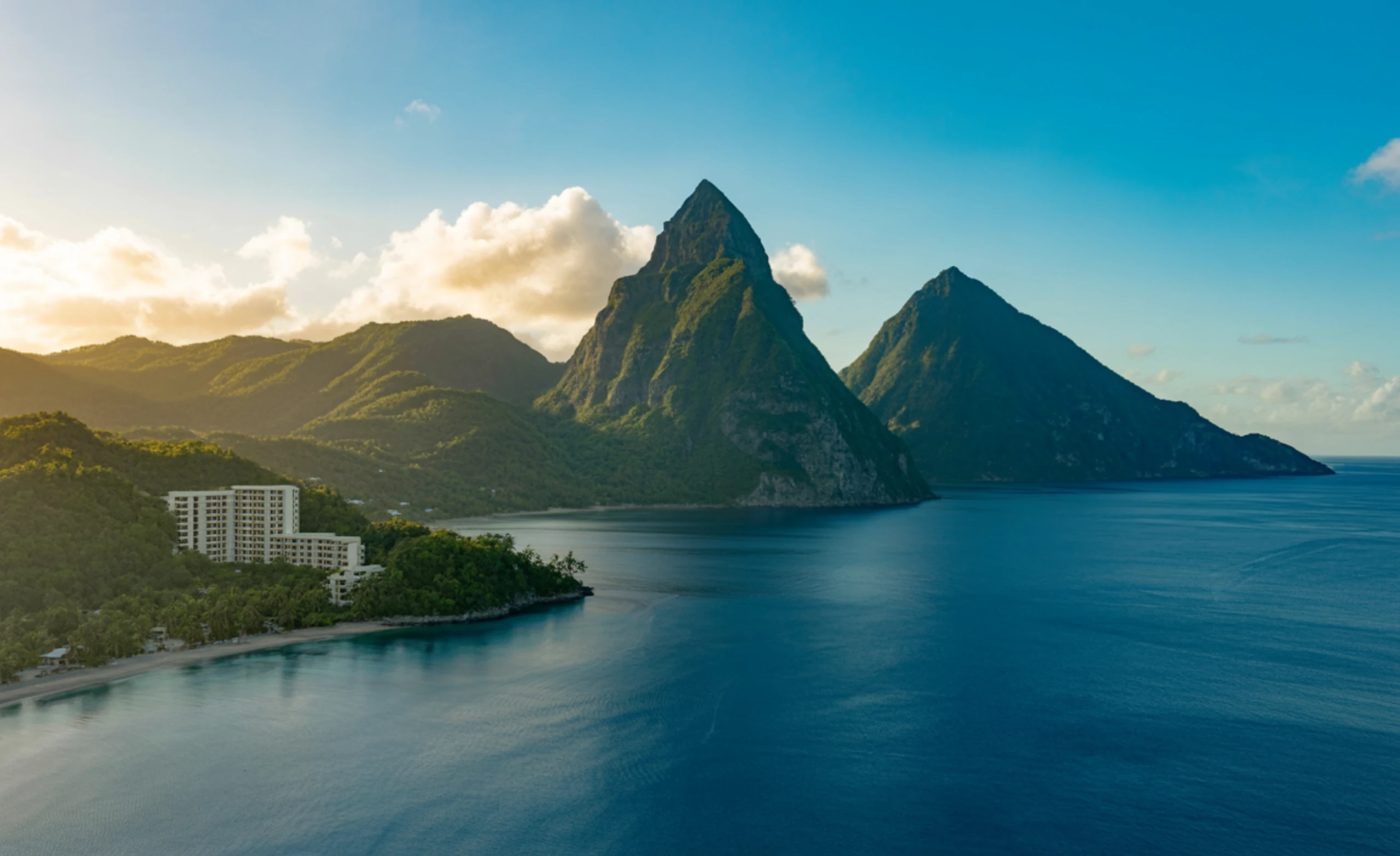 Saint Lucia Pitons rising from turquoise Caribbean waters in ultra high definition